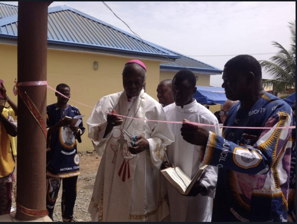 The Catholic Bishop of Ilorin Diocese Most Rev Ayo Maria Atoyebi OP cutting the tape to declare the Skill Acquisition Centre open. The Catholic Bishop of Ilorin Diocese Most Rev Ayo Maria Atoyebi OP cutting the tape to declare the Skill Acquisition Centre open.
